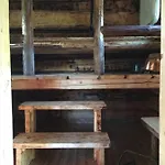 Savikulma Savihuone Habitación en casa particular Mynamaki